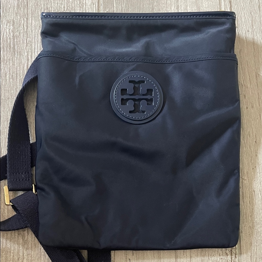 Classy Tory Burch Navy Crossbody Bag
9”W x 10 3/4”L